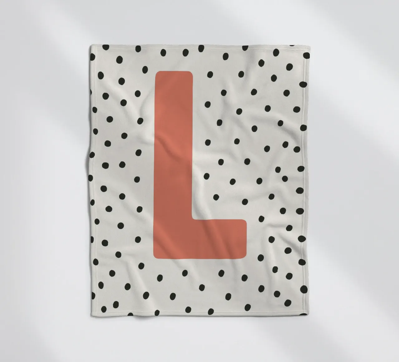 Initial L on dot pattern - Scandinavian style fleece blanket by KidzStudio