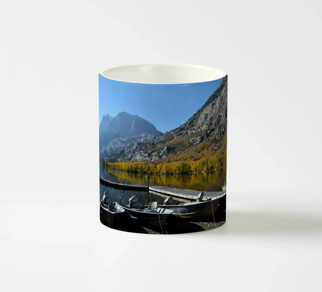 Serene Lake Morning with Dock and Boats ceramic mug by byrieneke