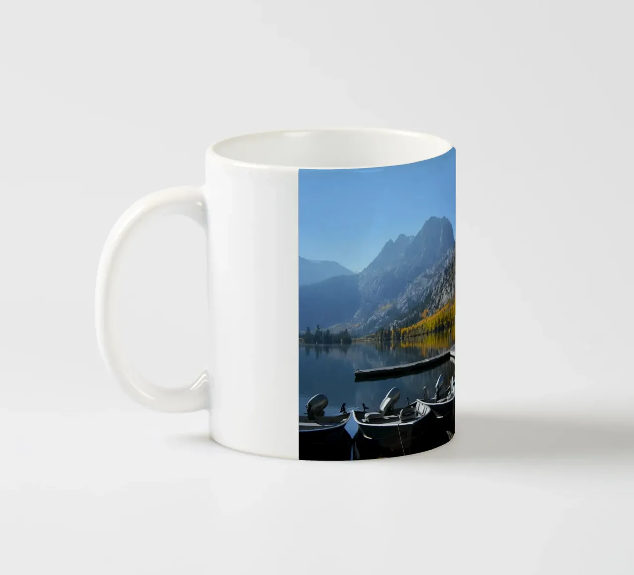 Serene Lake Morning with Dock and Boats ceramic mug by byrieneke