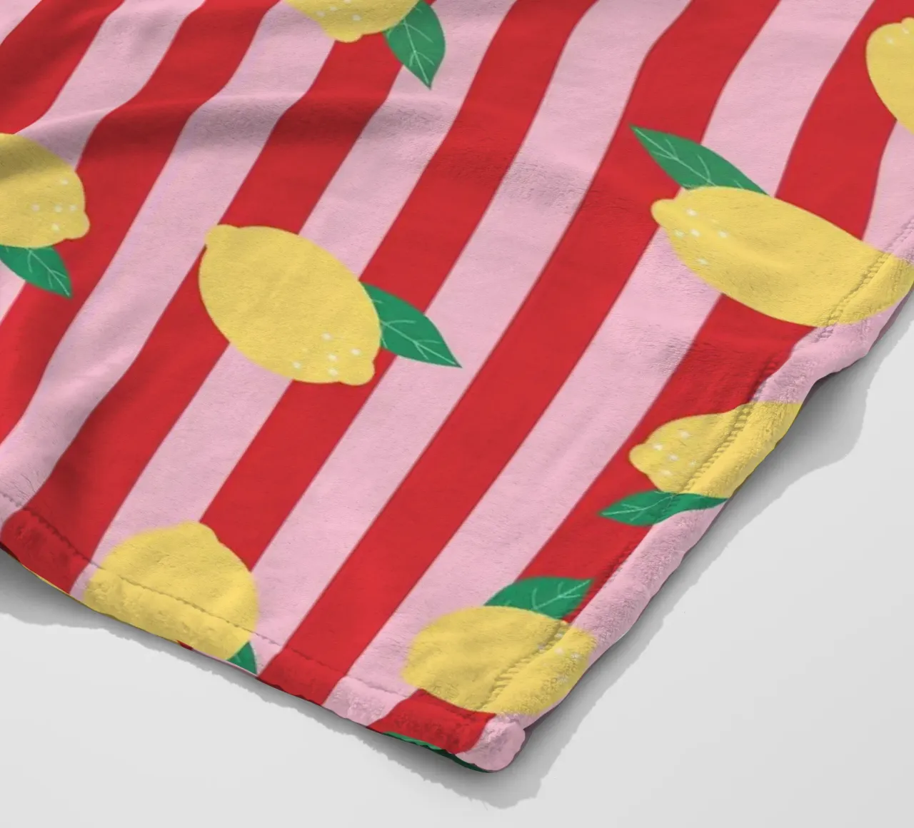 Bold Lemon Stripe Pattern on Pink and Red Background fleece blanket by The Art Club