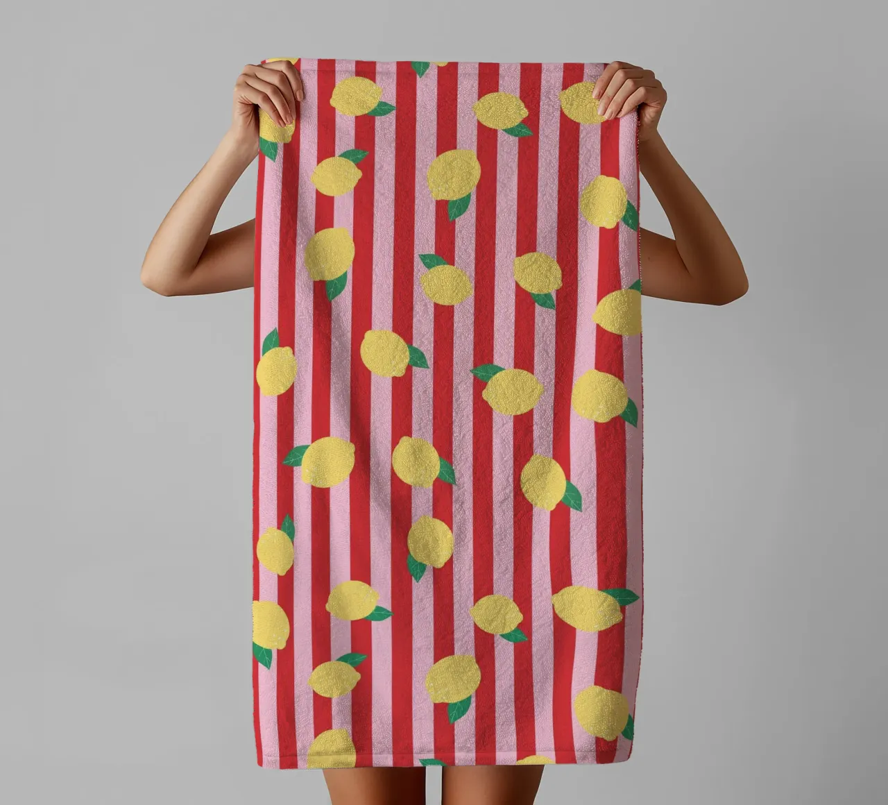 Bold Lemon Stripe Pattern on Pink and Red Background towel by The Art Club
