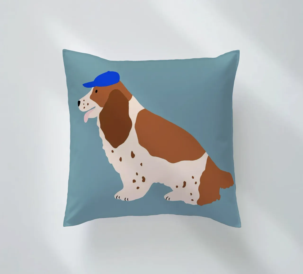 Cocker Spaniel con cappuccio blu cuscino da Maren Gross