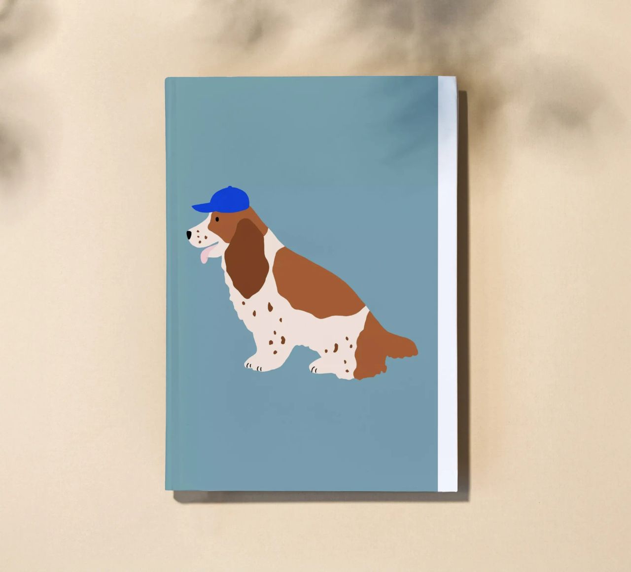 Cocker Spaniel with Blue cap notebook by Maren Gross