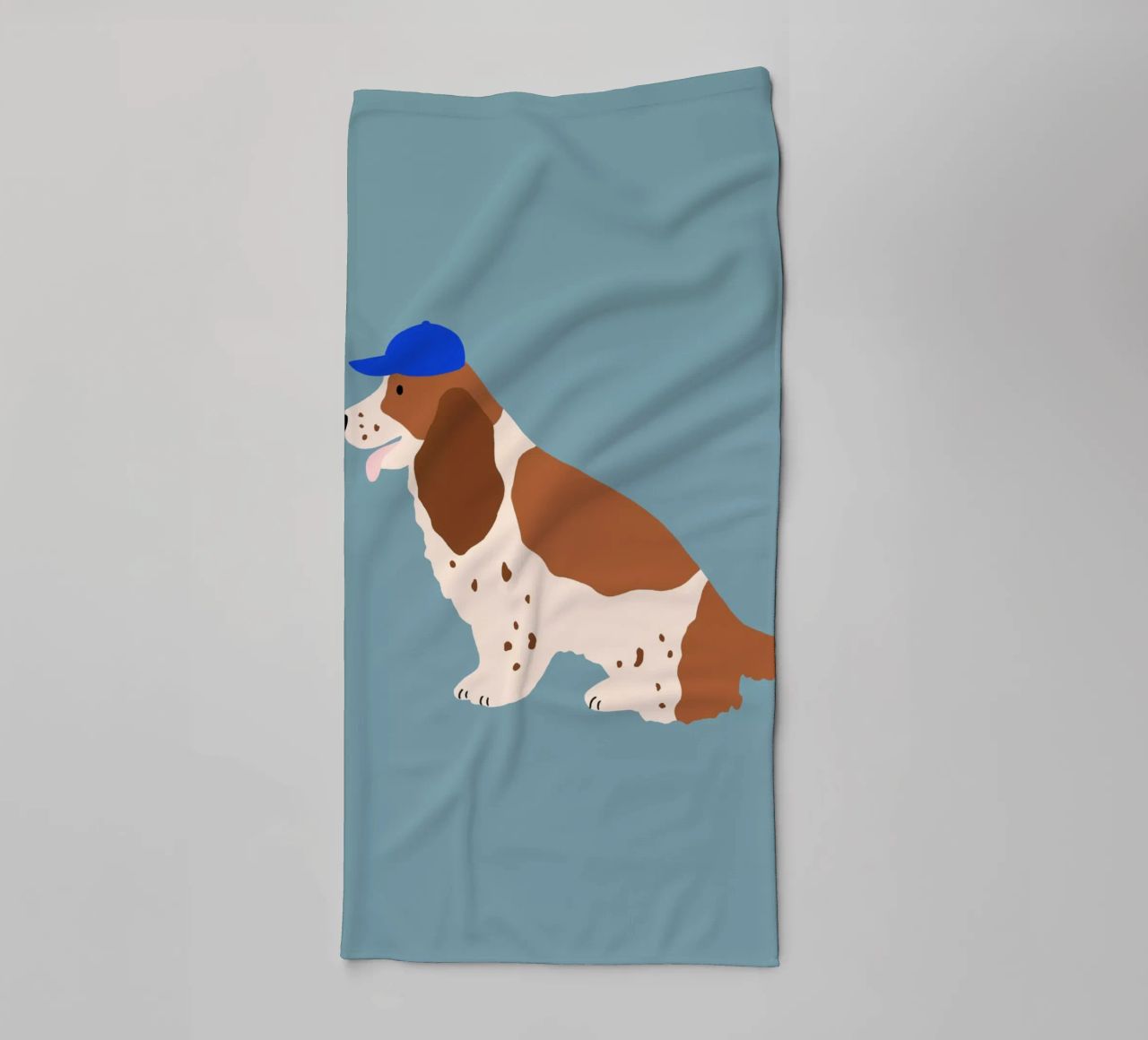Cocker Spaniel with Blue cap towel by Maren Gross
