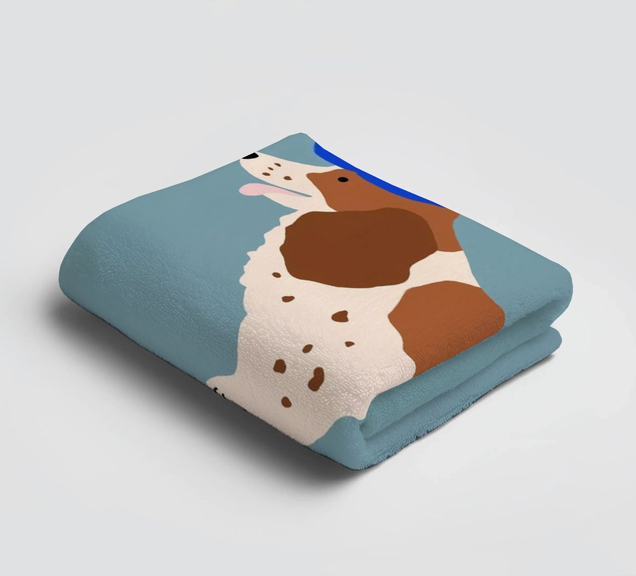 Cocker Spaniel with Blue cap towel by Maren Gross