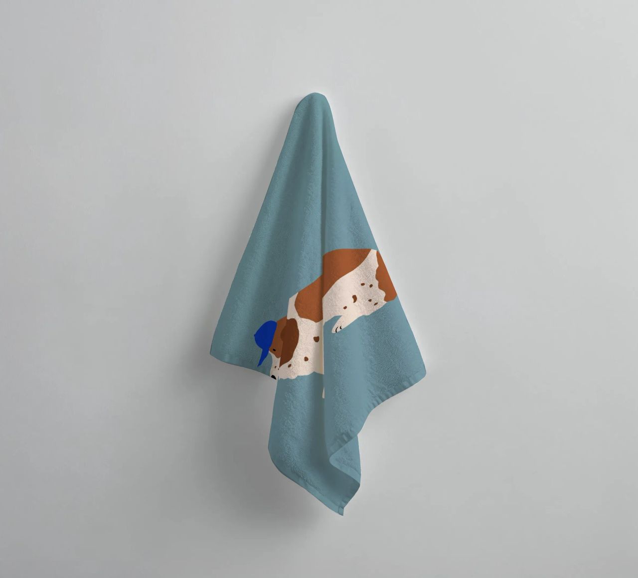 Cocker Spaniel with Blue cap towel by Maren Gross