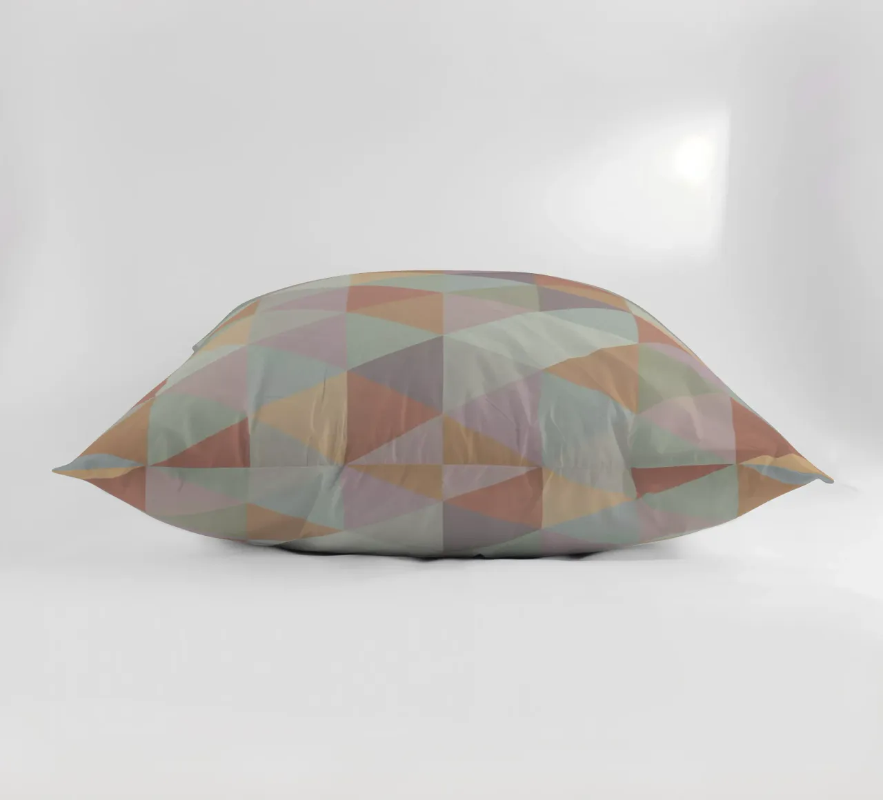 Colorful triangle pattern decorative cushion by Metron