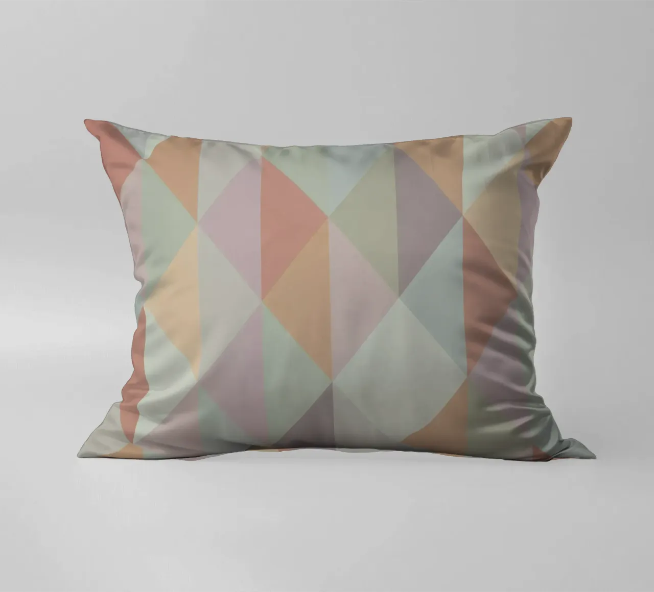 Colorful triangle pattern decorative cushion by Metron