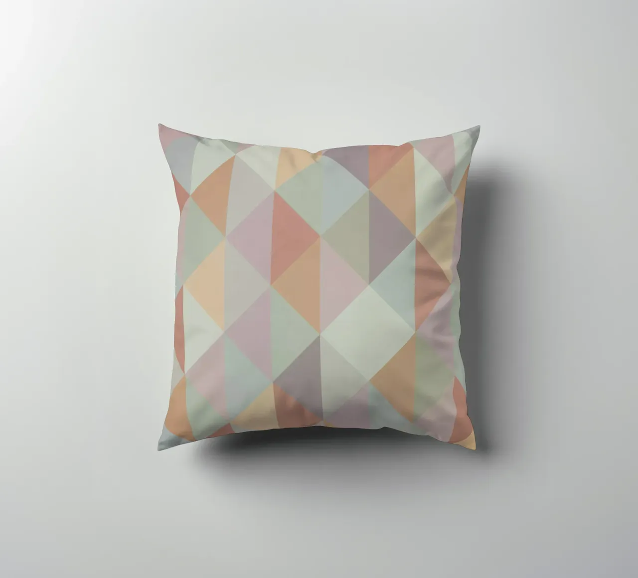 Colorful triangle pattern decorative cushion by Metron
