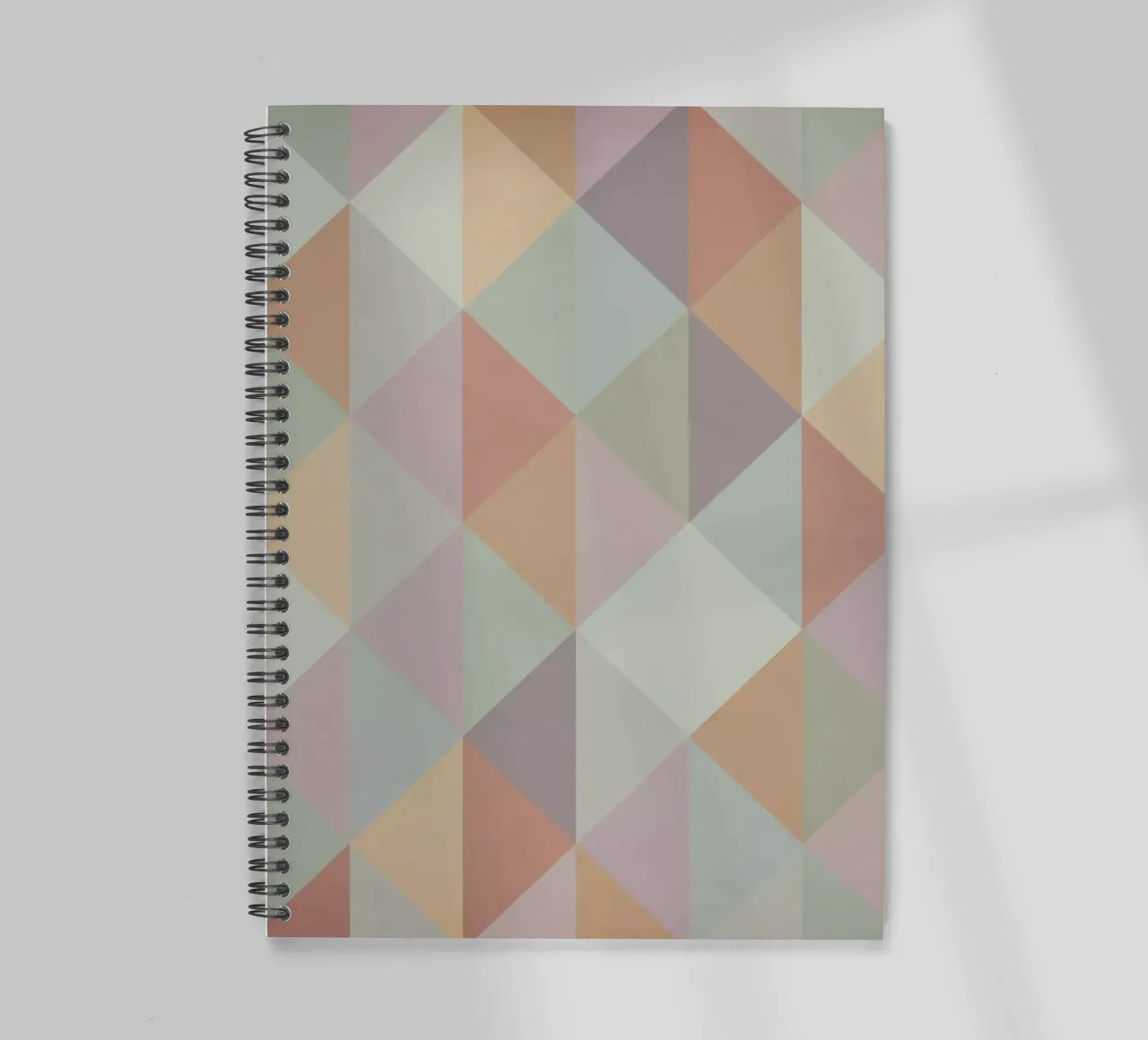Colorful triangle pattern spiral notebook by Metron