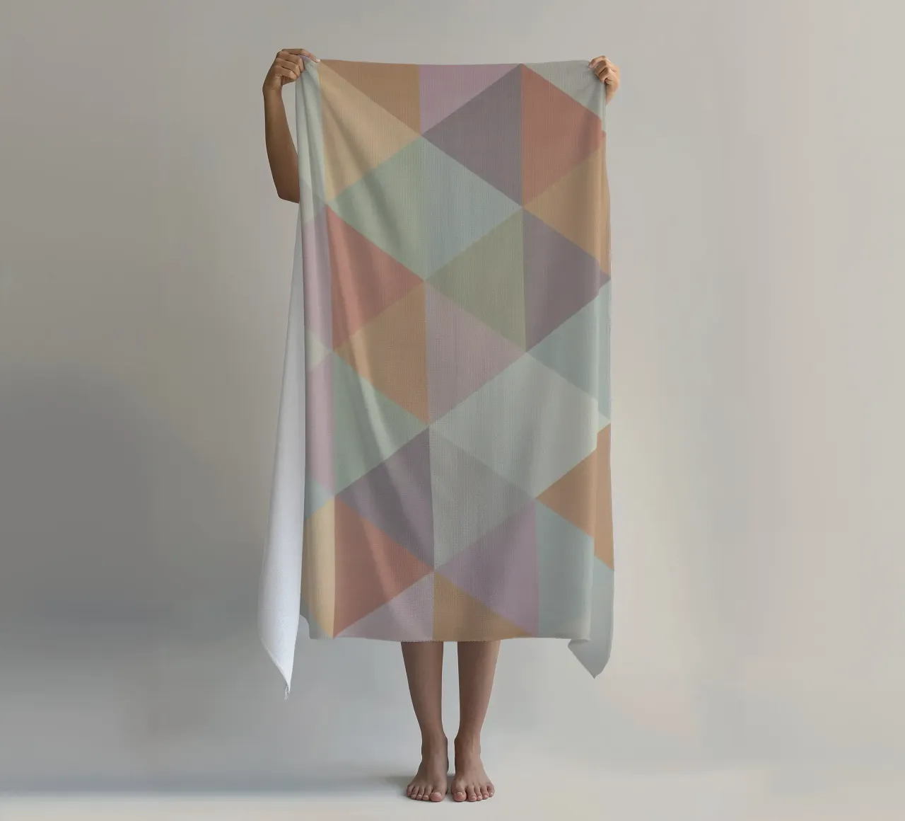 Colorful triangle pattern beach towel by Metron