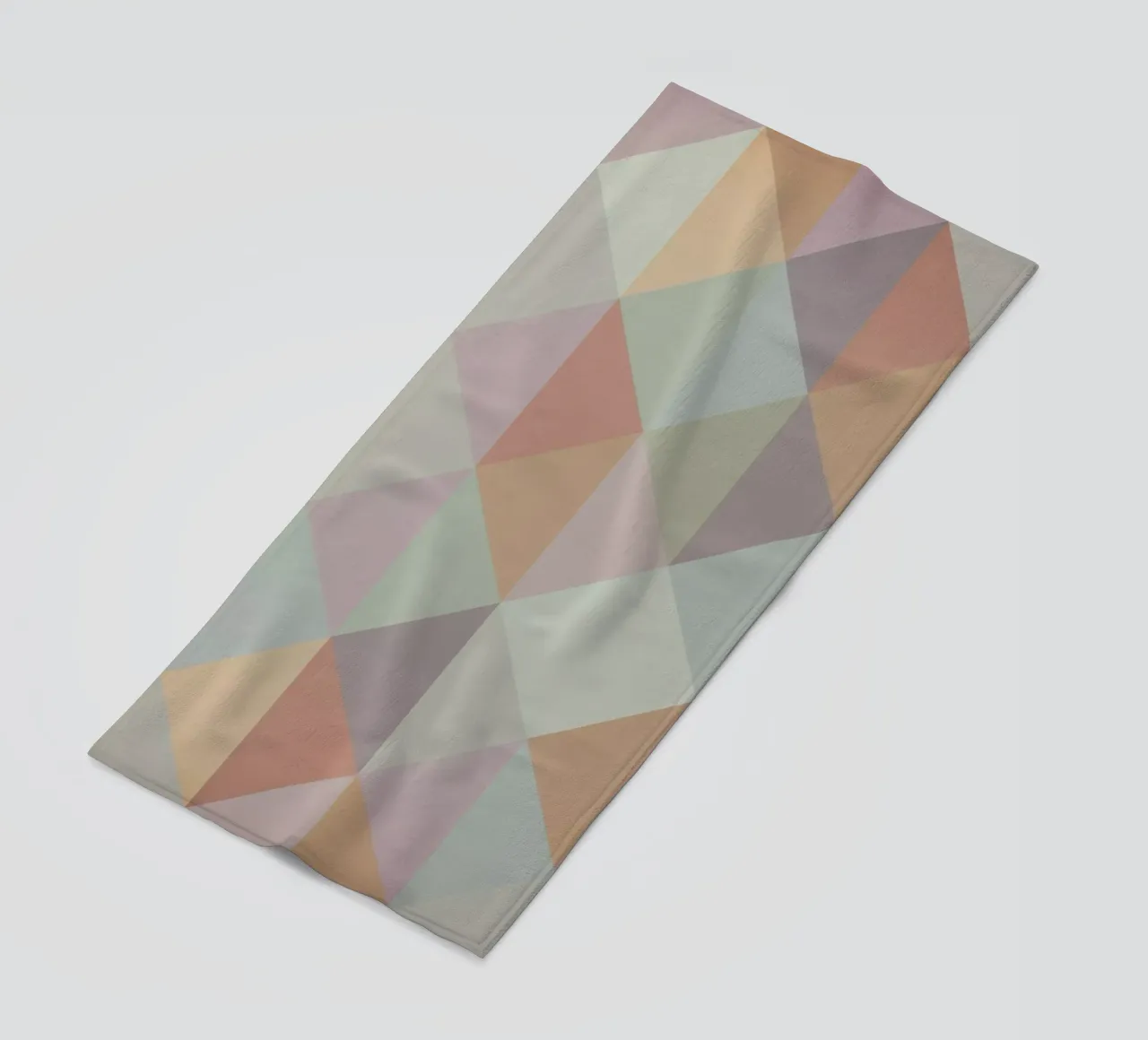 Colorful triangle pattern beach towel by Metron