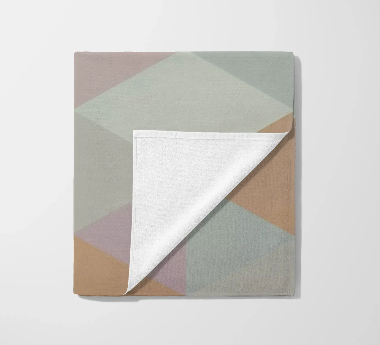 Colorful triangle pattern beach towel by Metron