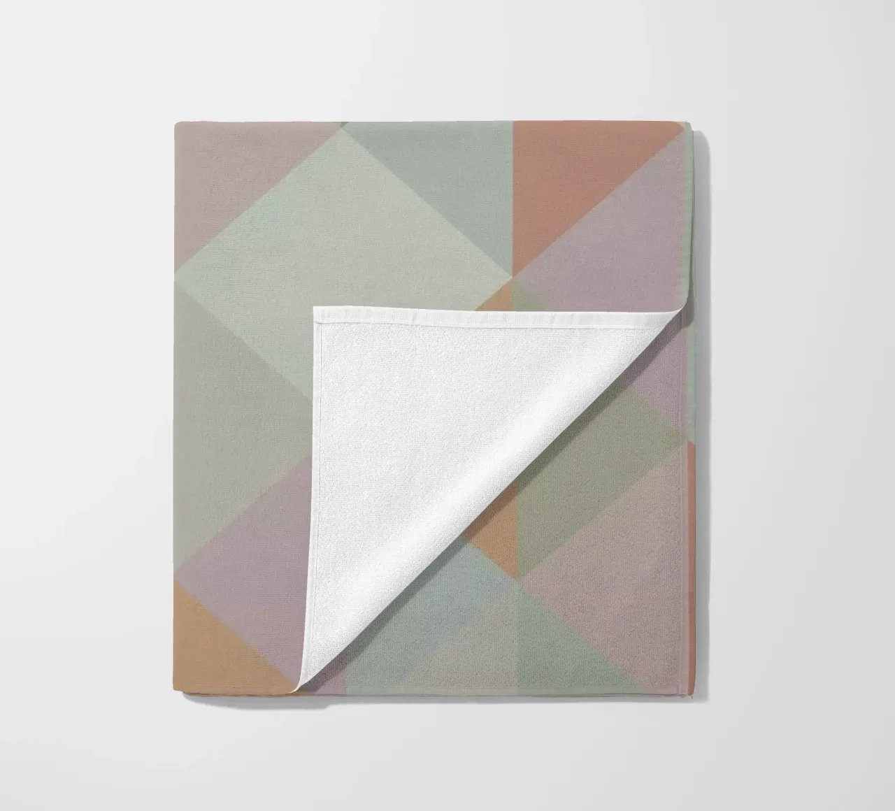 Colorful triangle pattern beach towel by Metron