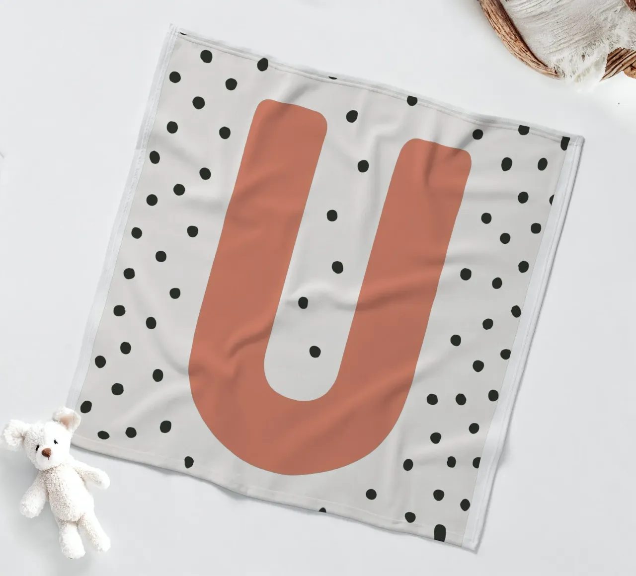 Initial U on dot pattern - Scandinavian style fleece blanket by KidzStudio