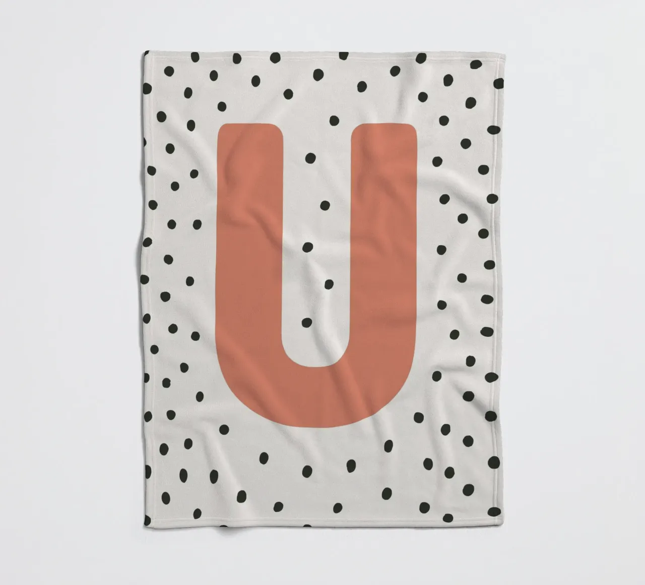 Initial U on dot pattern - Scandinavian style fleece blanket by KidzStudio