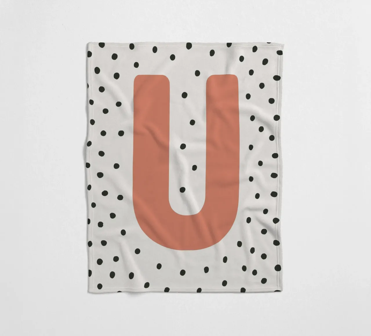 Initial U on dot pattern - Scandinavian style fleece blanket by KidzStudio