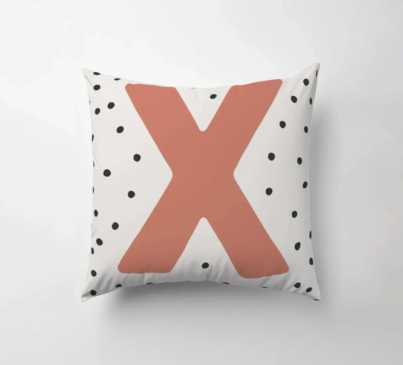 Initial X on dot pattern - Scandinavian style decorative cushion by KidzStudio
