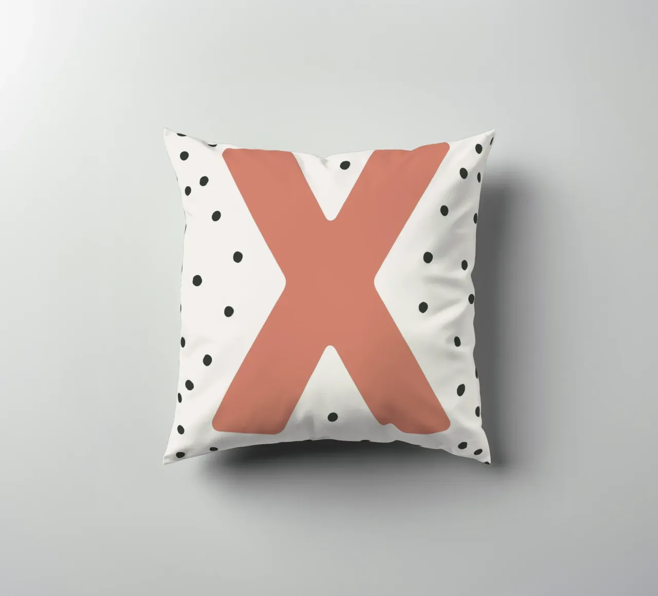 Initial X on dot pattern - Scandinavian style decorative cushion by KidzStudio