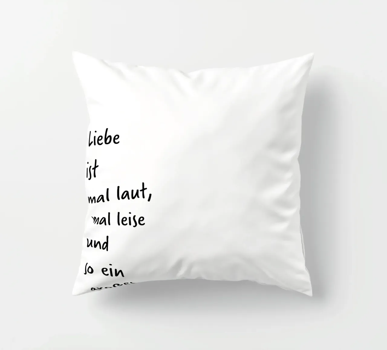 Liebe ist mal laut, mal leise und so ein großes Wort. decorative cushion by FRICKE DESIGN