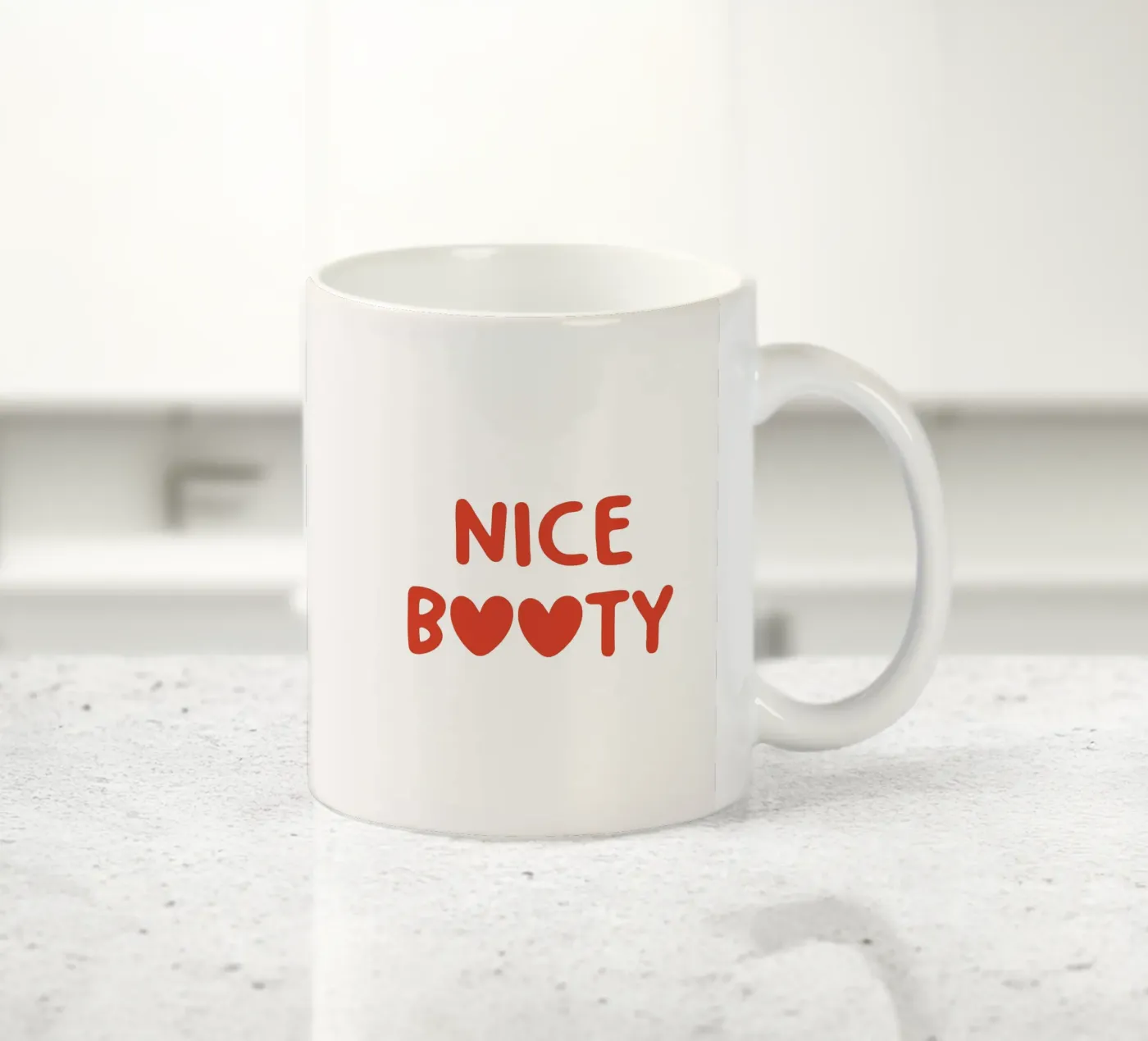 Nice Booty ceramic mug by Paigaam Studio
