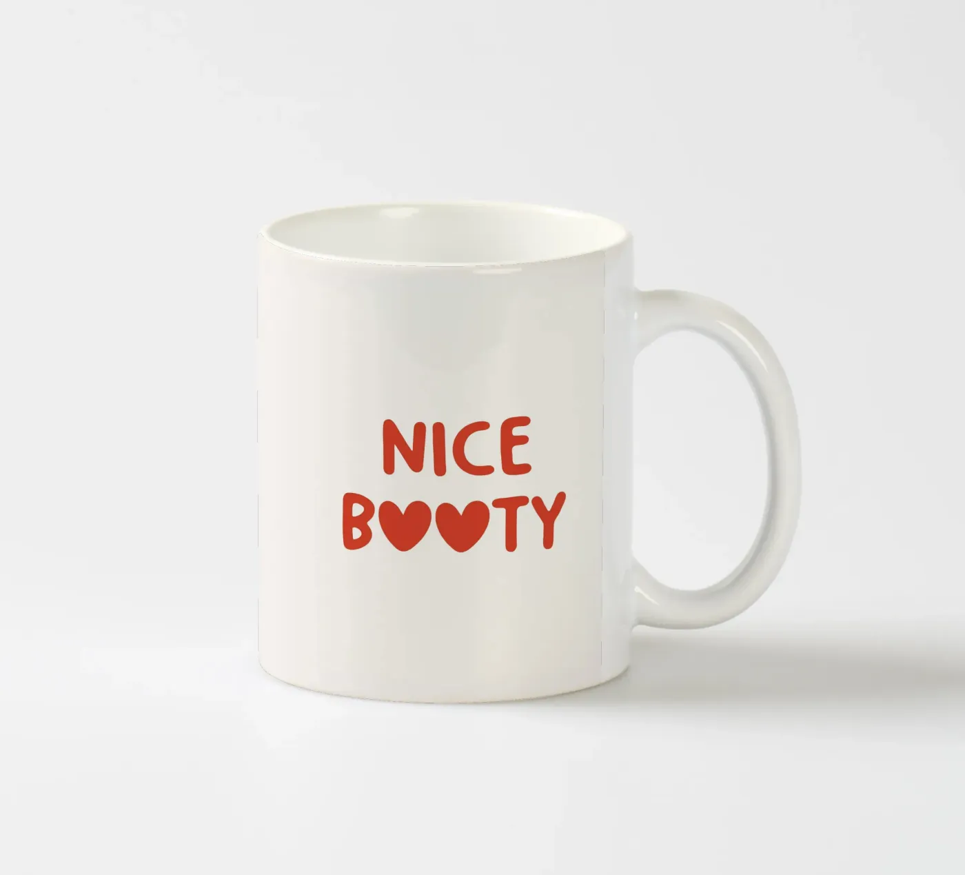 Nice Booty ceramic mug by Paigaam Studio