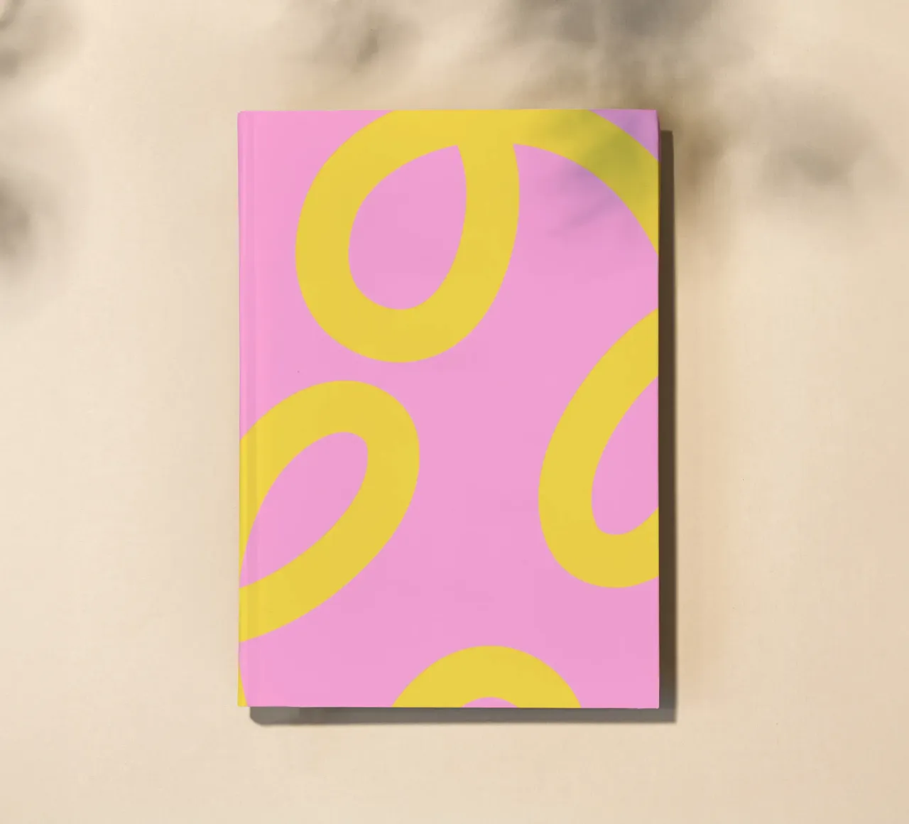 Playful Yellow Swirl Pattern on Pink Background notebook by The Art Club