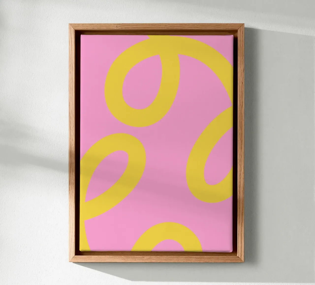 Playful Yellow Swirl Pattern on Pink Background canvas with Floater frame by The Art Club