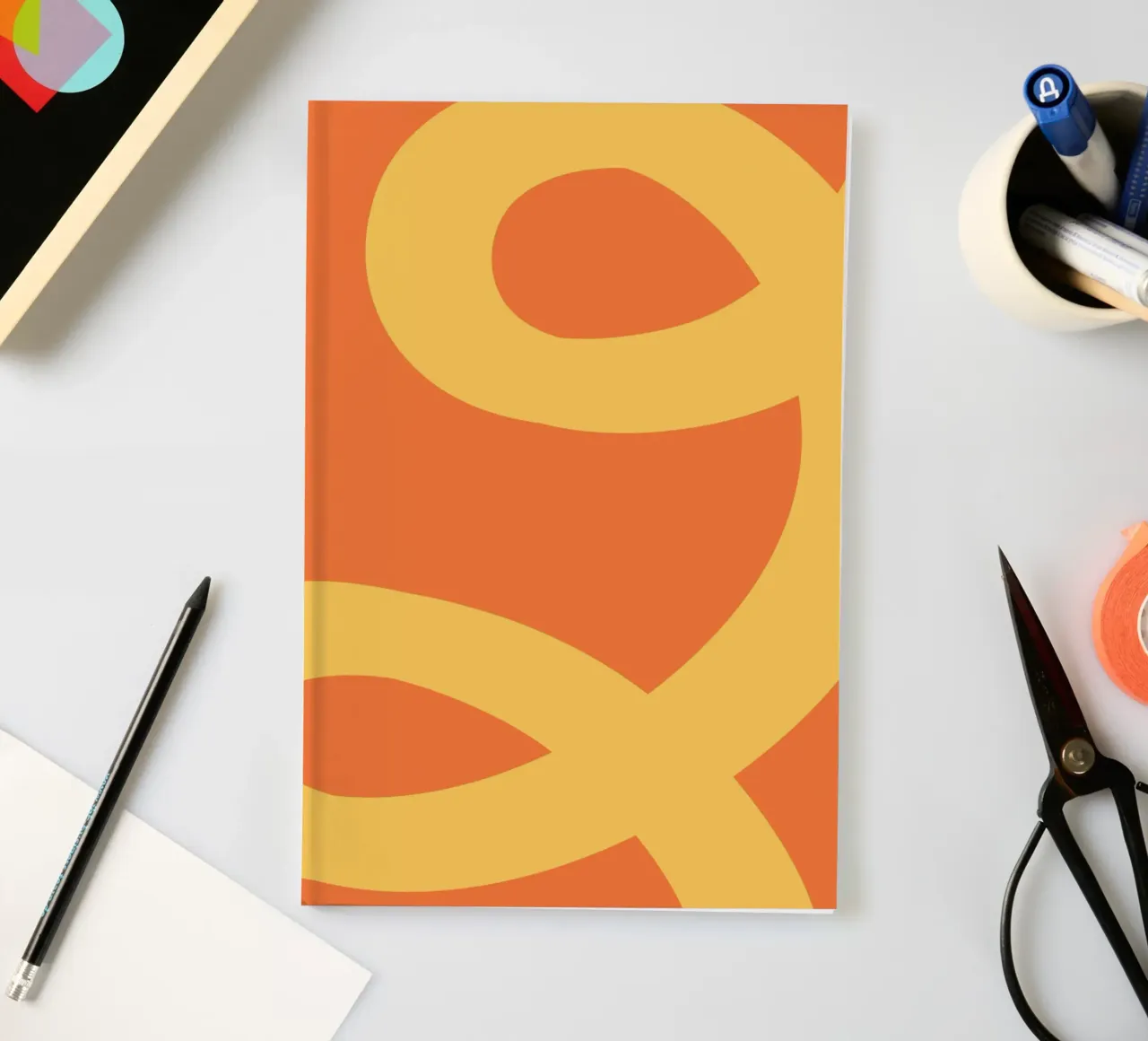Golden Yellow Loops on Vibrant Orange notebook by The Art Club