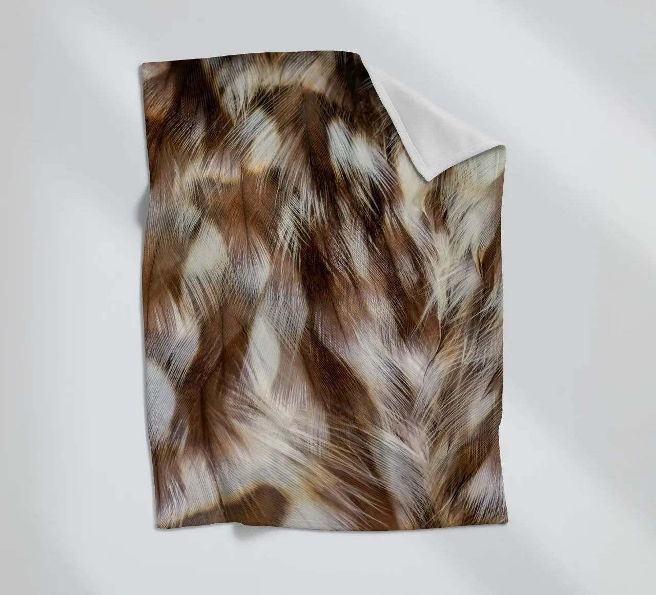 piume marrone coperta in pile da Earthly Visions