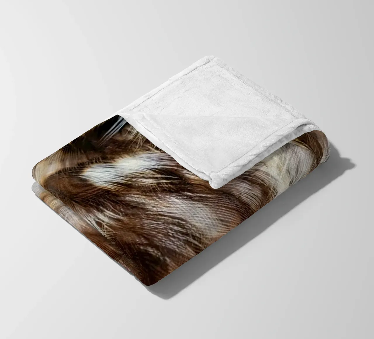 piume marrone coperta in pile da Earthly Visions