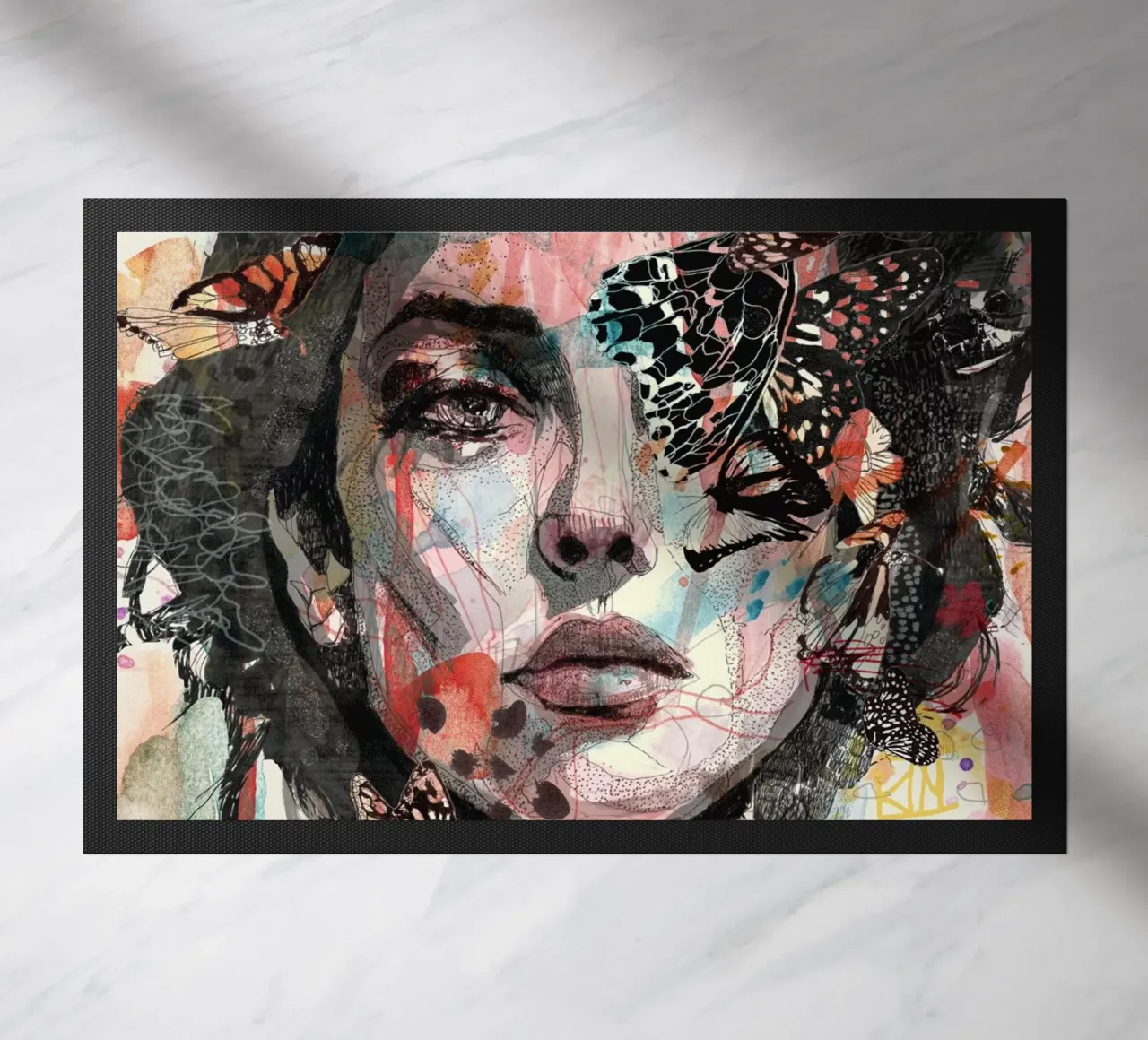 vlinder deurmat van Giulio Iurissevich