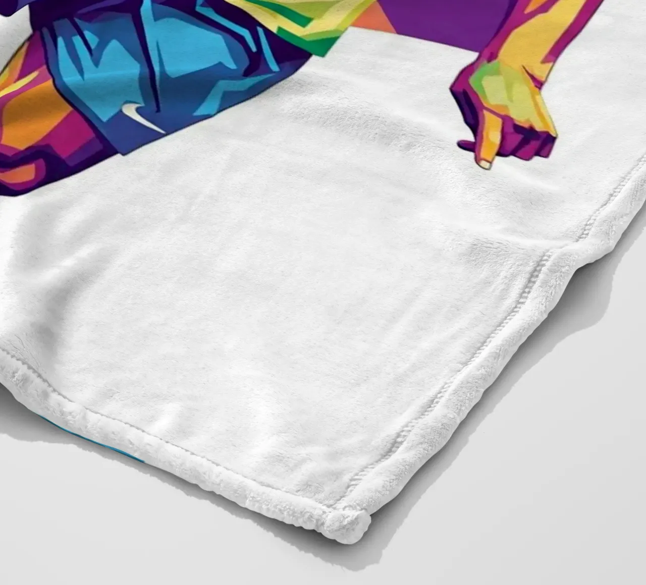 Ronaldinho con l'iconico sorriso coperta in pile da Hantamrata