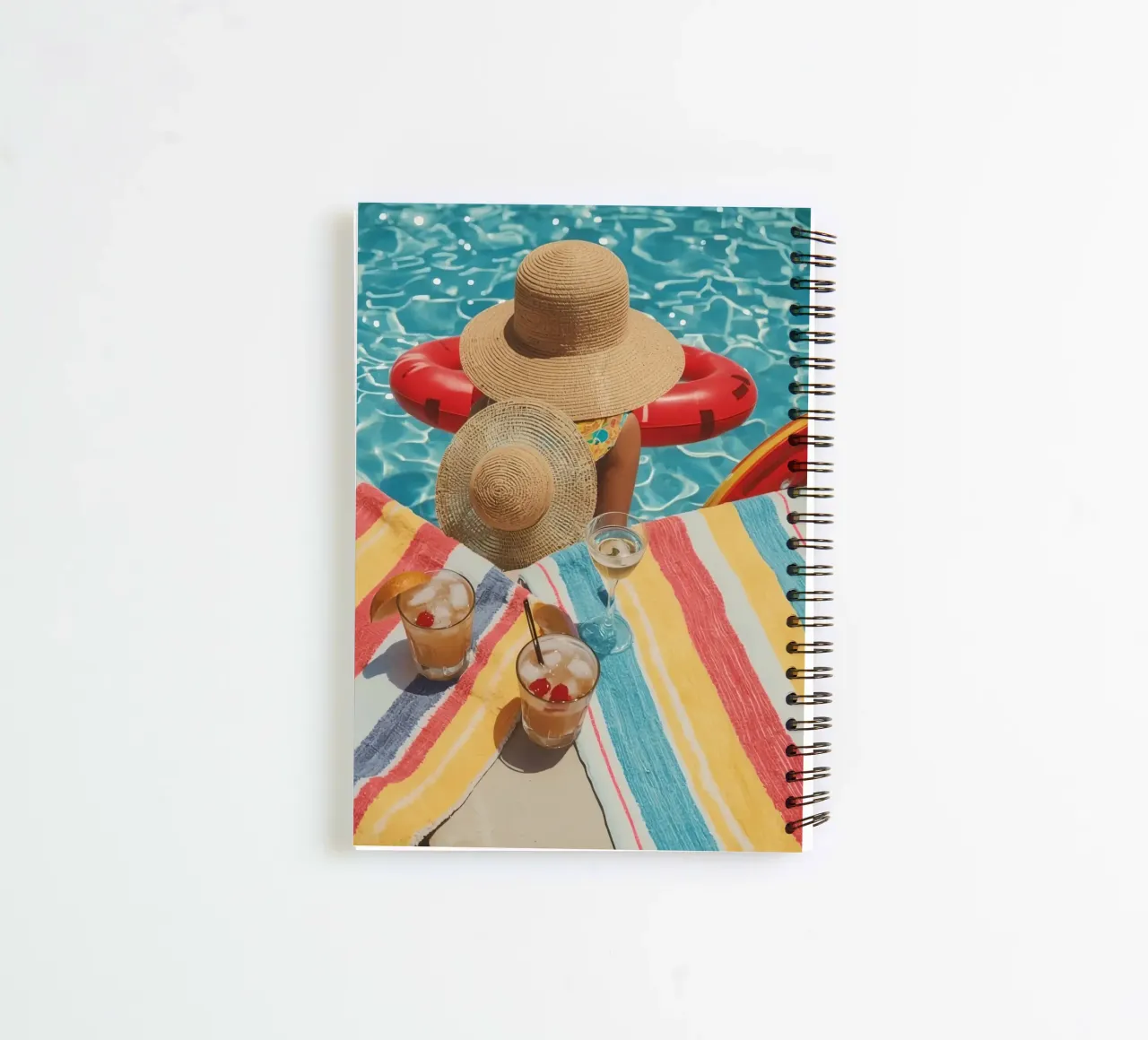 Drinks Hats and Pool Float Beside Swimming Pool spiral notebook by DesignDoodle