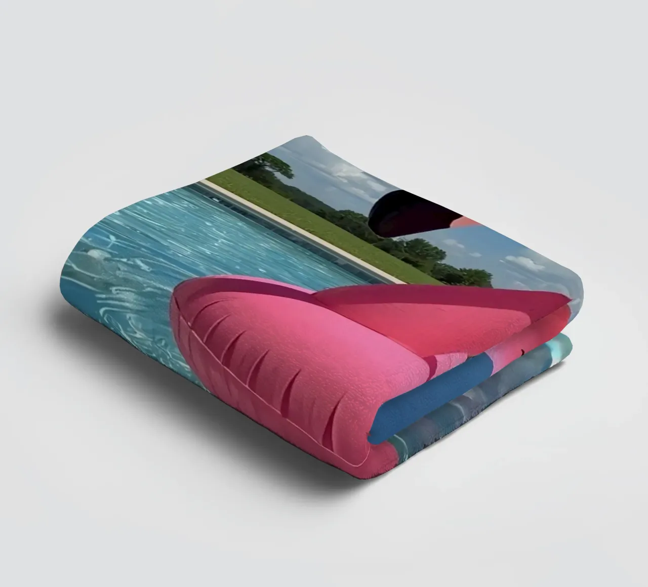 Pink Inflatable Flamingo Pool Float in Swimming Pool towel by DesignDoodle