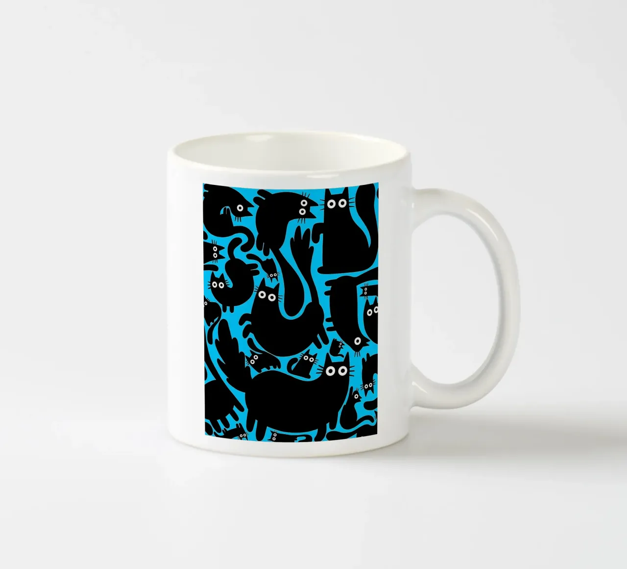 Un gruppo di gatti tazza in ceramica da Kaden