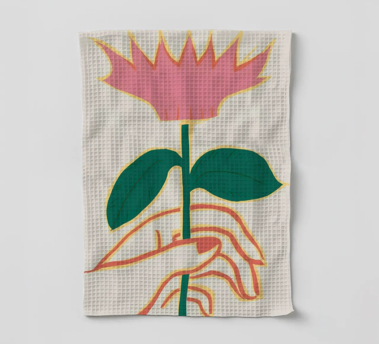 Main tenant une fleur torchon de Gaia Viesta