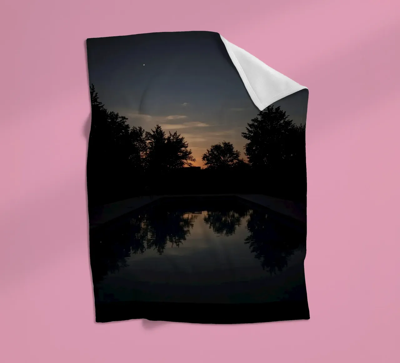 Swimming Pool at Dusk with Tree Reflections and Sunset Sky fleece blanket by DesignDoodle