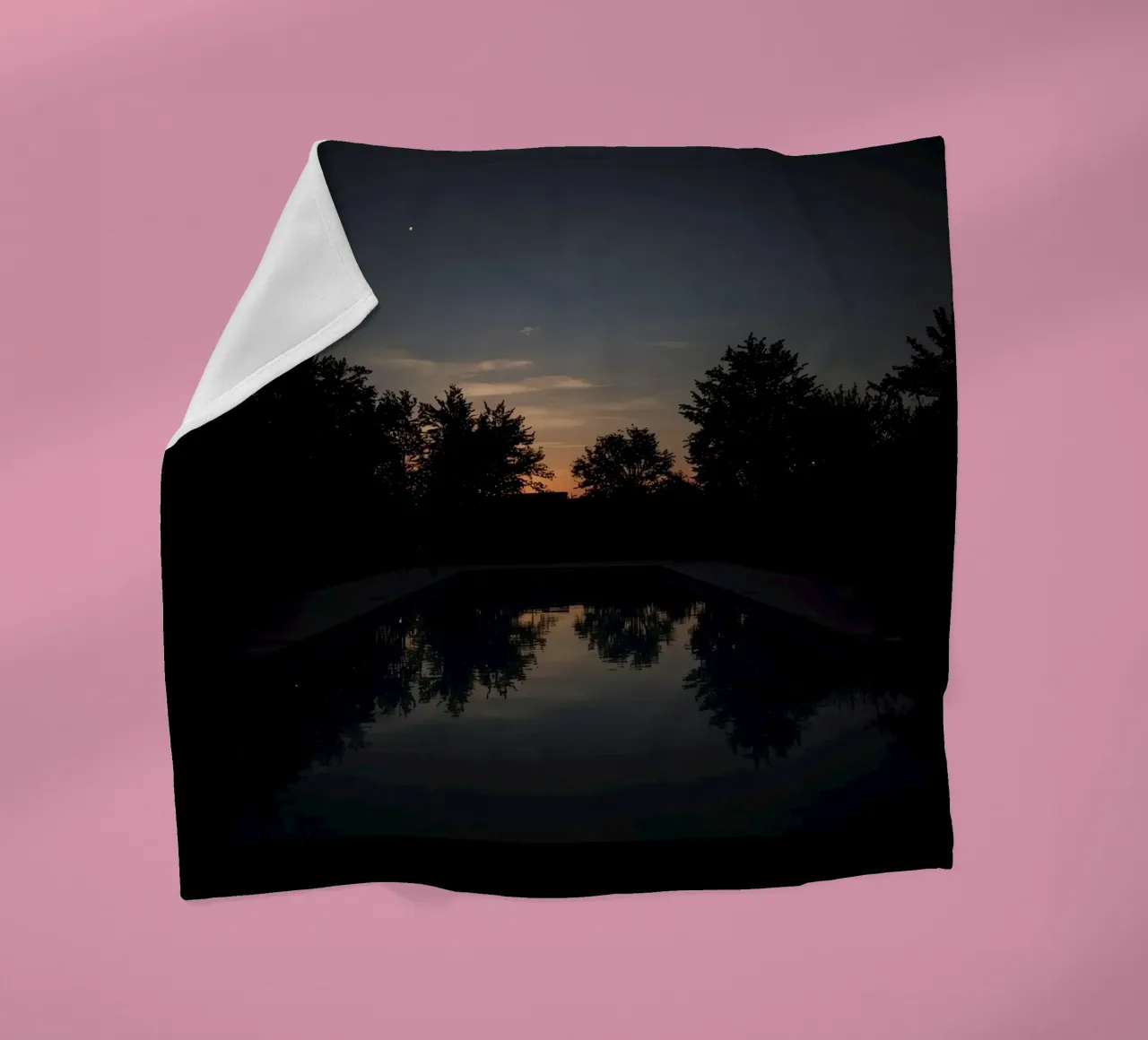 Swimming Pool at Dusk with Tree Reflections and Sunset Sky fleece blanket by DesignDoodle