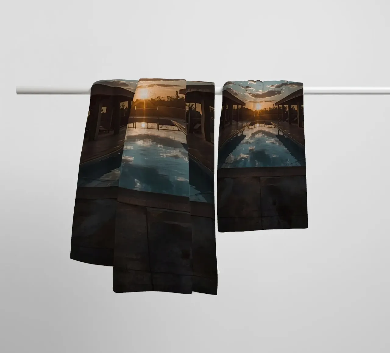 Swimming Pool Reflecting Sunset with Covered Structures towel by DesignDoodle