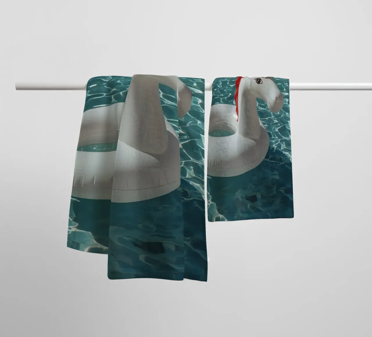 Unicorn Inflatable in Swimming Pool towel by DesignDoodle