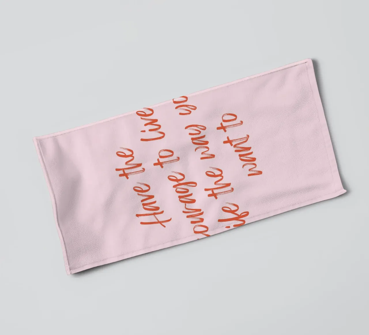 Empowering Quote Print - Bold Red Brush Script auf Rosa Handtuch von Ink &Echo