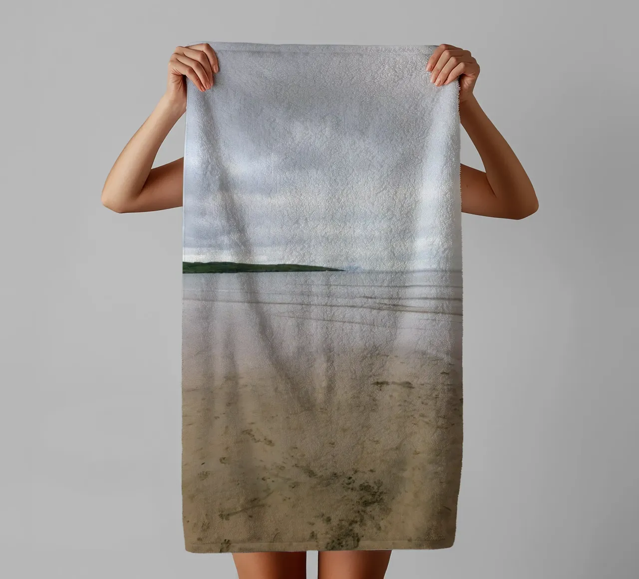 Silence on the tidal beach towel by The Wild Creative Studio