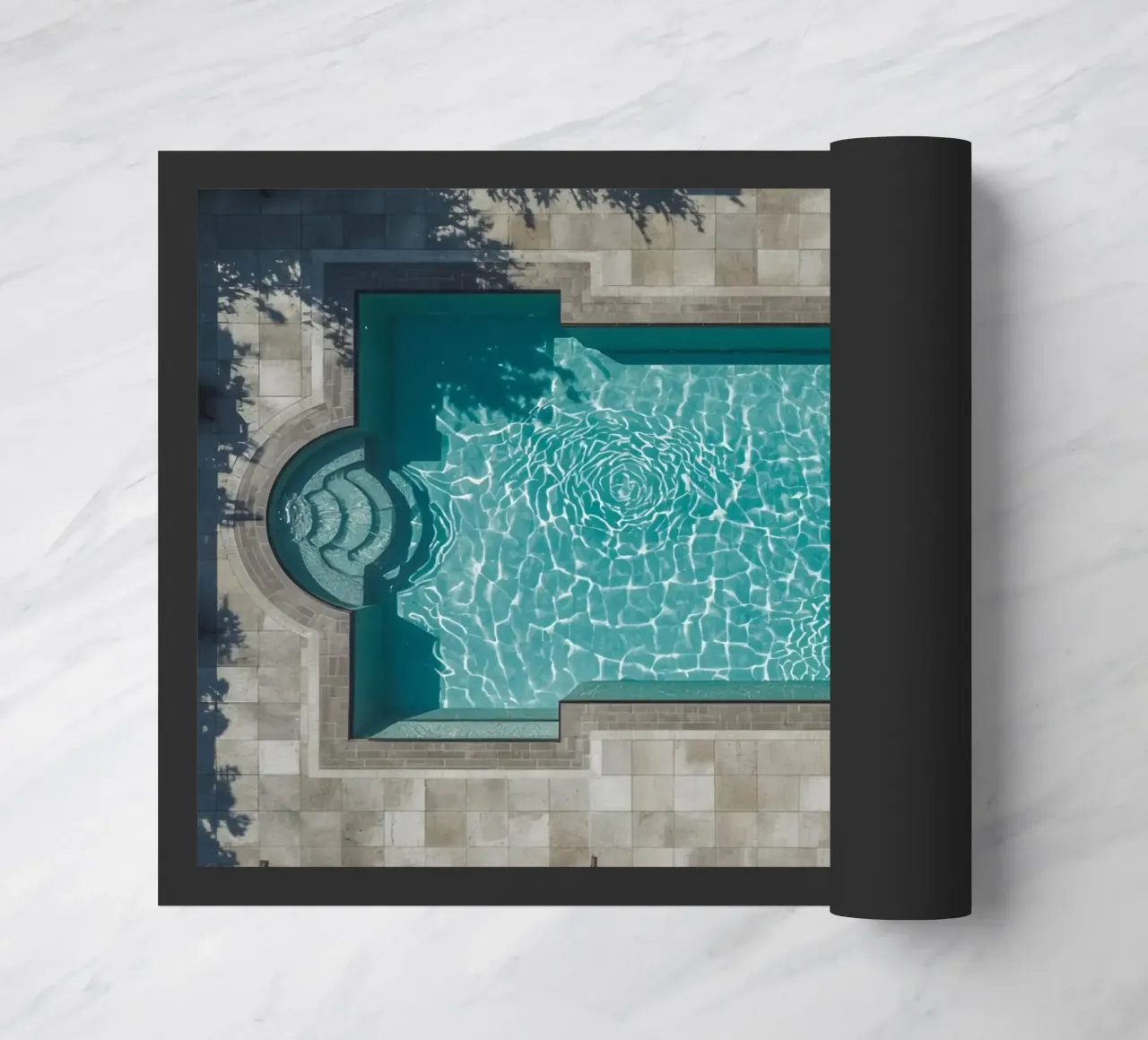 Vue aérienne d'une piscine rectangulaire avec un patio en pierre paillasson de DesignDoodle