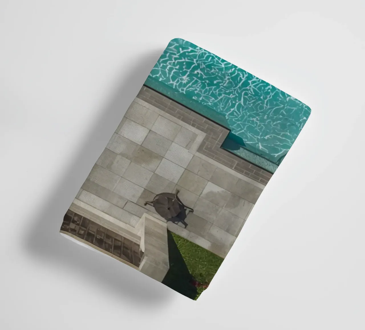 Aerial View of Rectangular Swimming Pool with Stone Patio towel by DesignDoodle