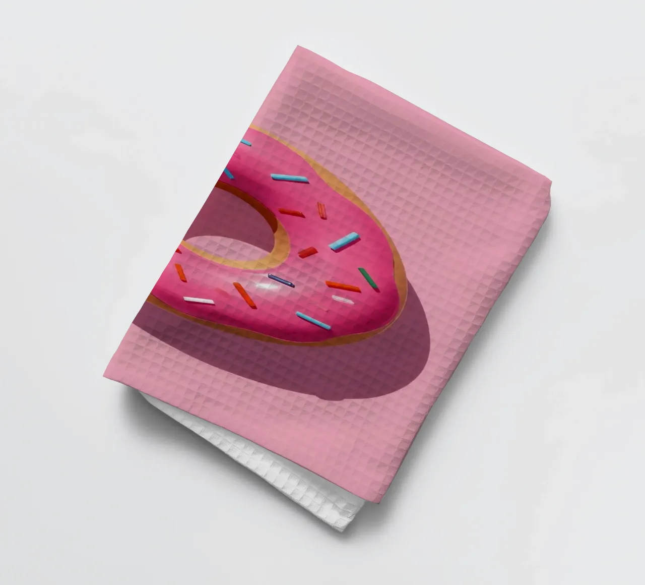 Vue aérienne d'un beignet givré rose avec des paillettes torchon de DesignDoodle