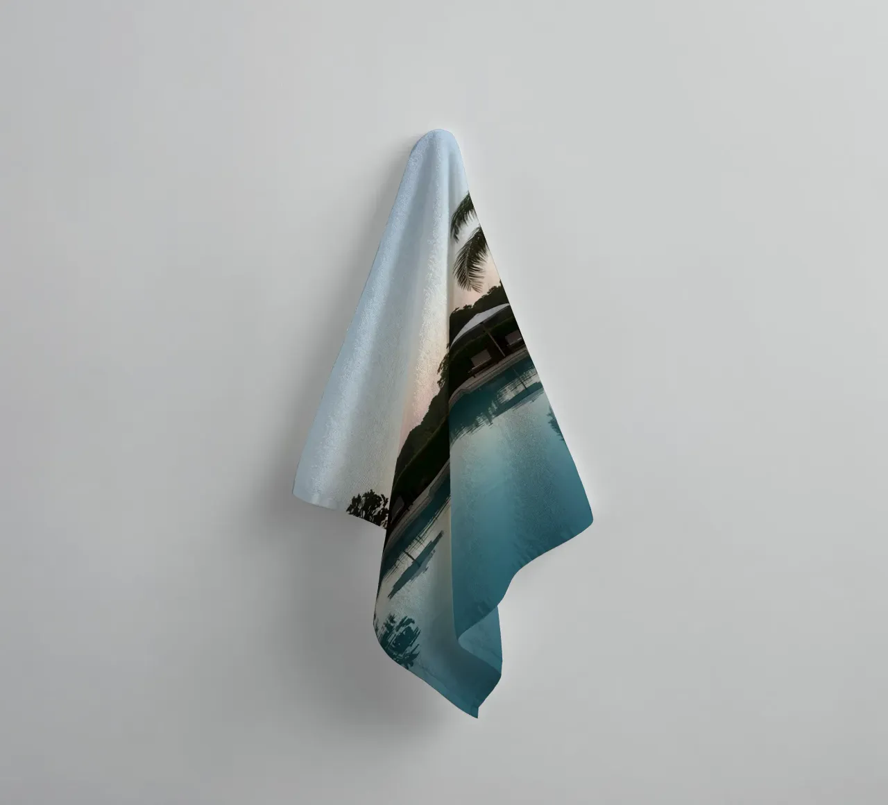 Swimming Pool Reflecting Palm Trees and Umbrellas at Dusk towel by DesignDoodle