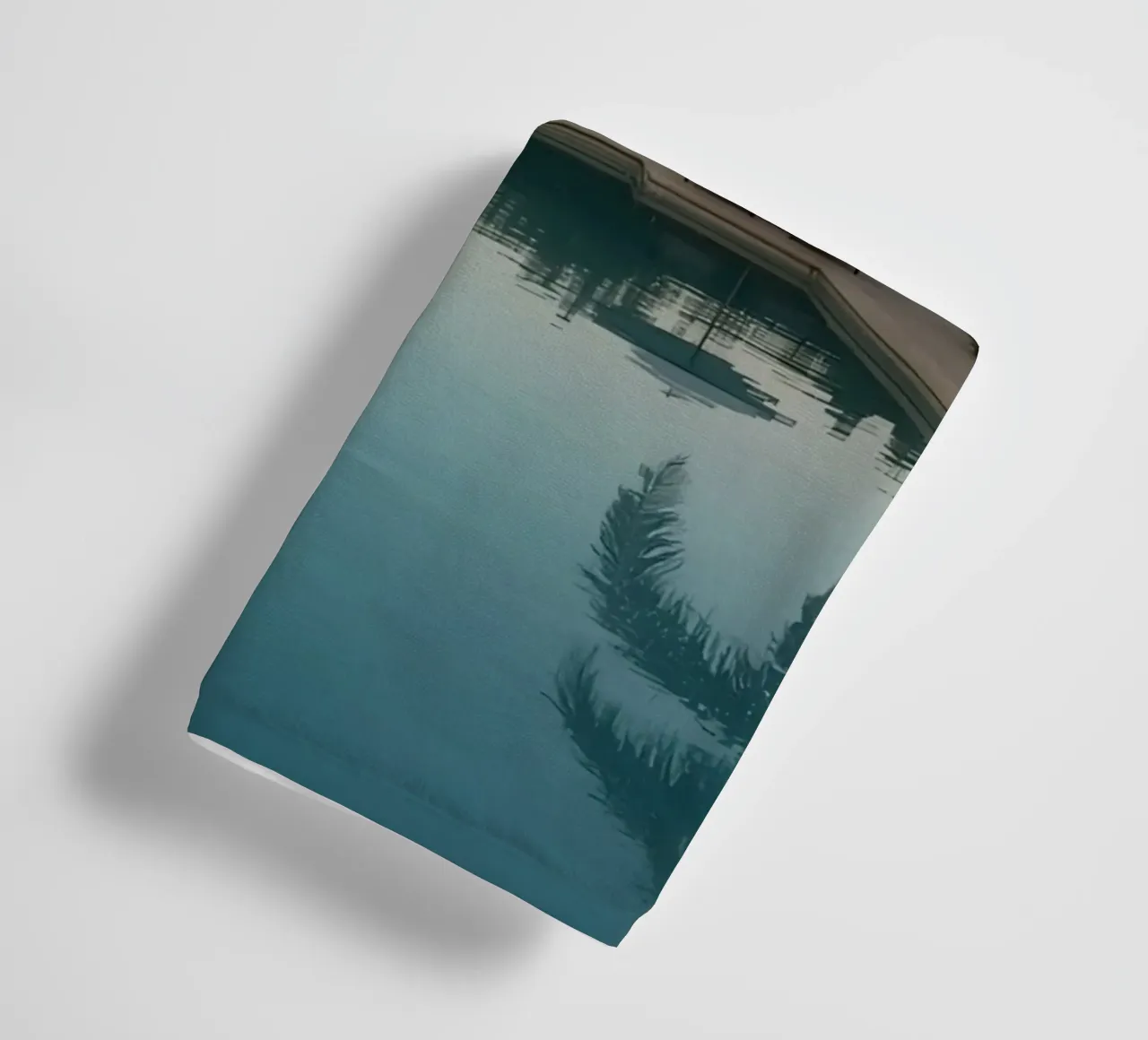 Swimming Pool Reflecting Palm Trees and Umbrellas at Dusk towel by DesignDoodle