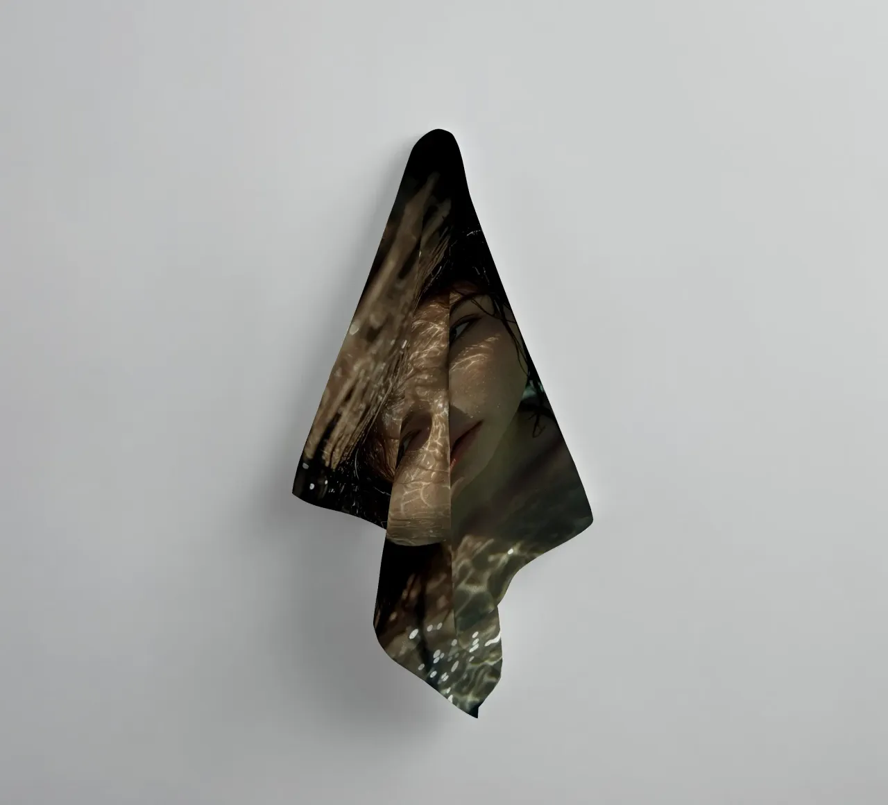 Woman's Face Underwater with Refracted Light Patterns towel by DesignDoodle