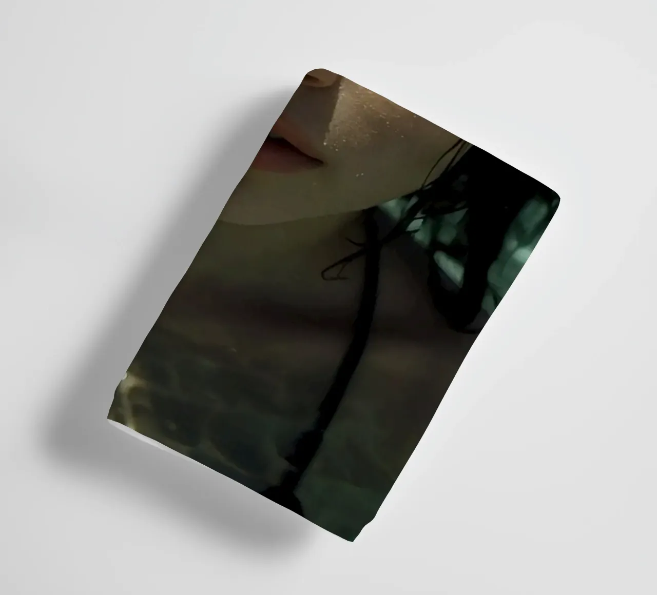 Woman's Face Underwater with Refracted Light Patterns towel by DesignDoodle